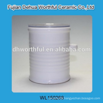 White ceramic tea canister with plastic cover